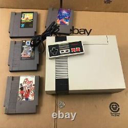 Nintendo NES-001 Control Deck Game System Console with Controller and 4 Games