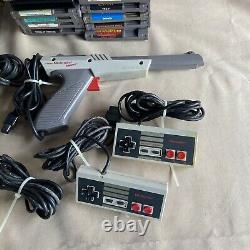 Nintendo NES System Console Lot 26 Games 1 Gun 4 Controllers and Cables