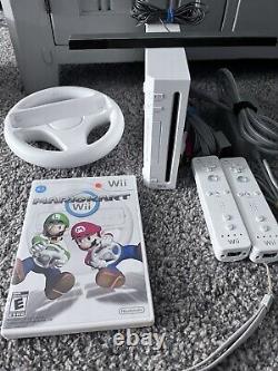 Nintendo Wii Mario Kart Console System Bundle With 2 Controllers, Wheels, & Game
