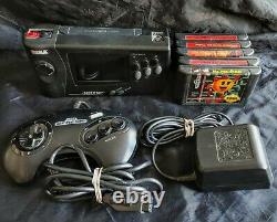 Sega Genesis Nomad System power adapter, controller and 5 games